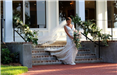 Bride Walking Down Stone Steps