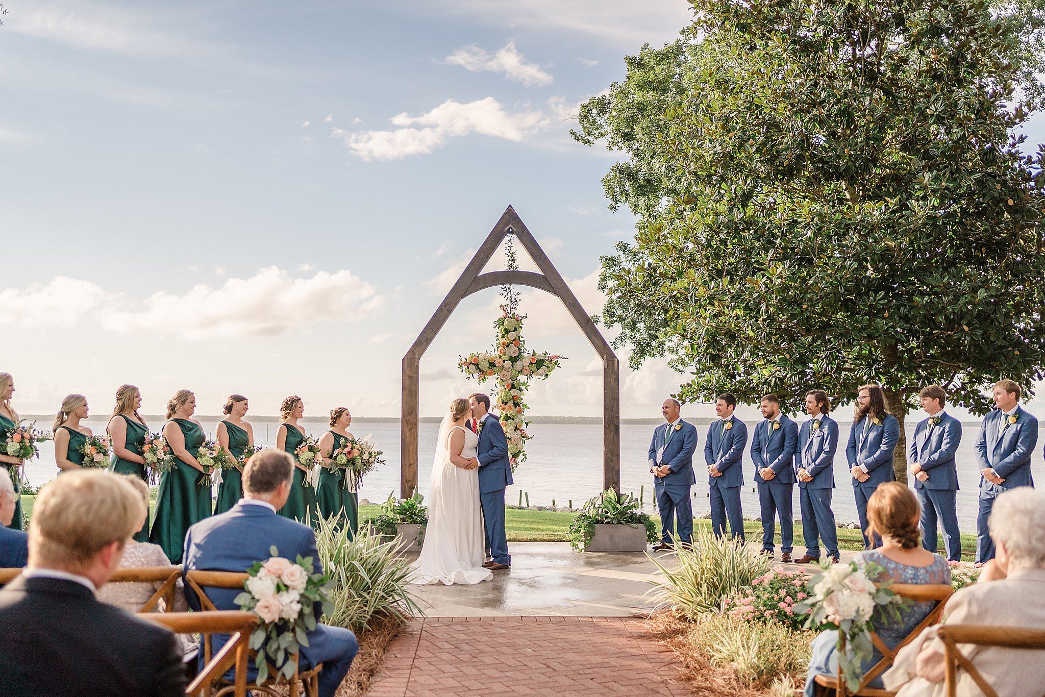 Couple's First Kiss in front of Wolf Bay
