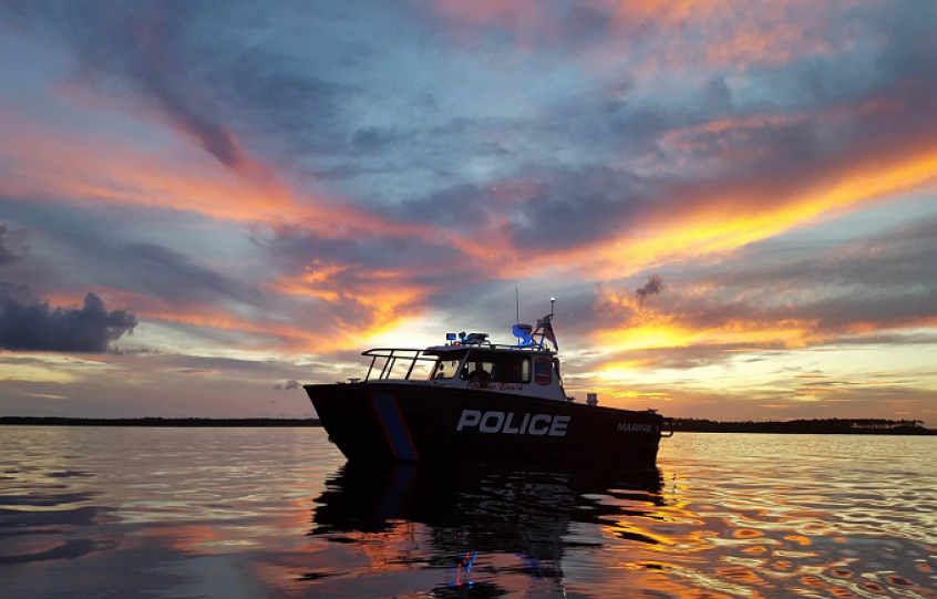 Marine Patrol Boat During a Sunset
