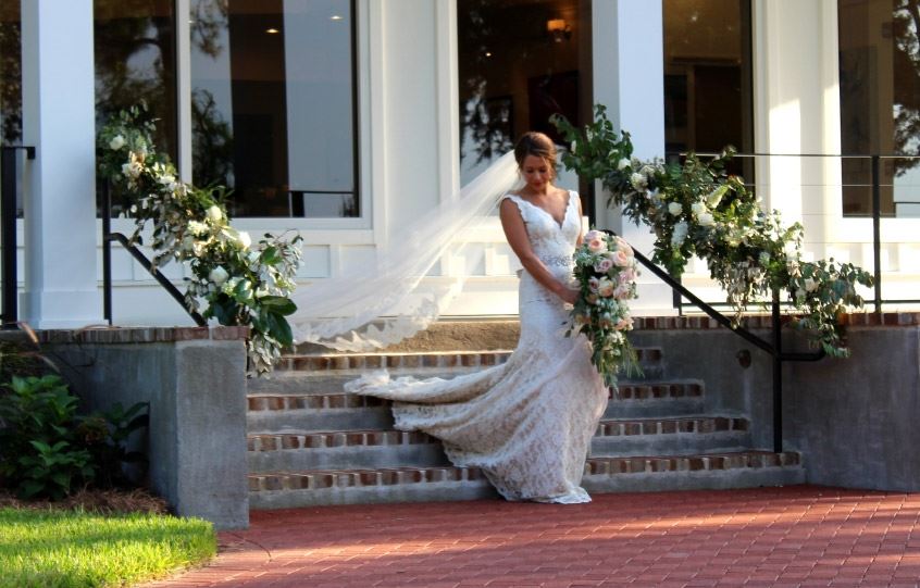 Bride Walking Down Brick Steps